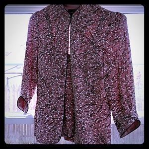 Jacket with matching sleeveless top.